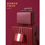 A pair of red leather wedding suitcases/dowry trunks for brides, featuring a combination lock.